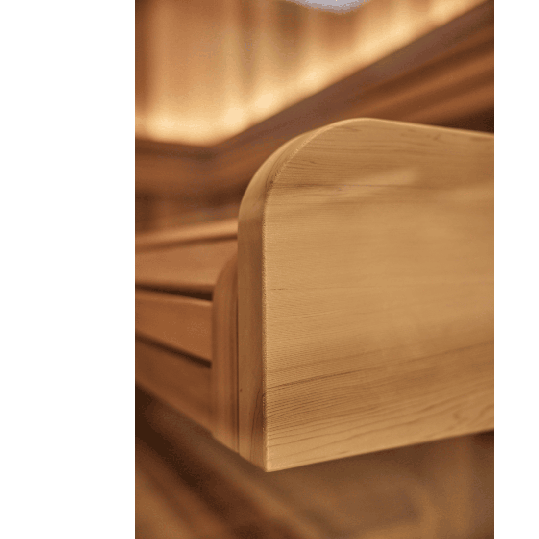 Close-up of side of a sauna bench with a smooth finish