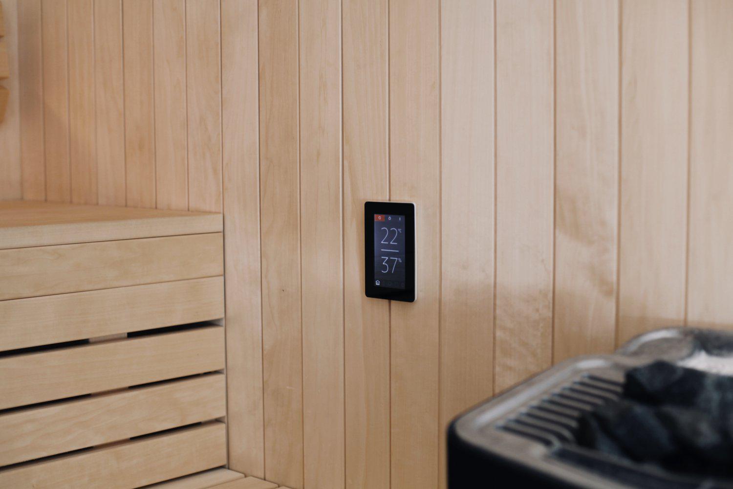 Tylo Elite control panel fixed to light wood sauna wall