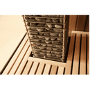 Close up of HUUM Cliff sauna heater embedded into wooden bench
