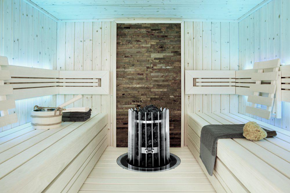 Helo Rocher Elite sauna heater with control panel embedded in light coloured sauna with stainless collar