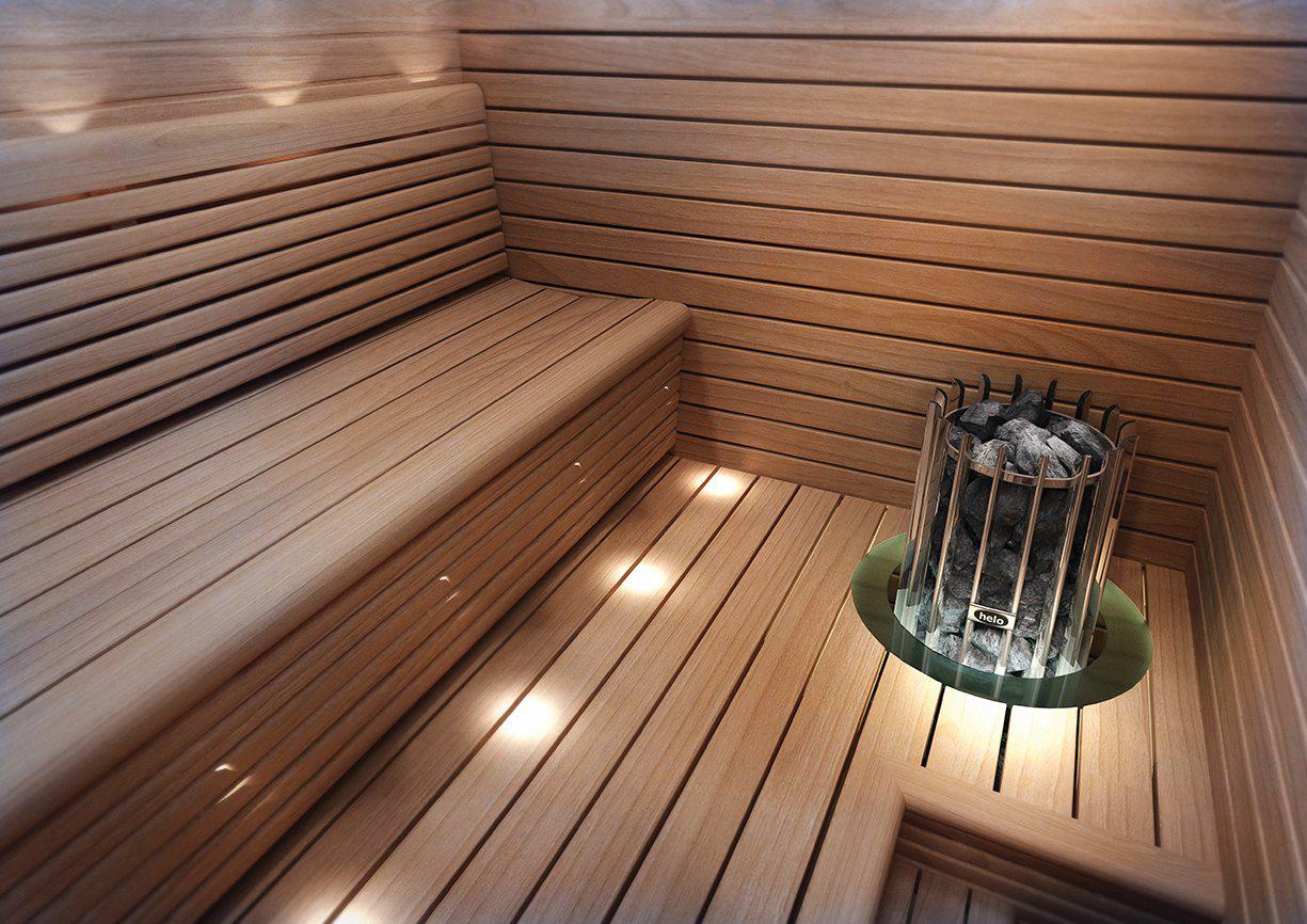 Helo Rocher Elite sauna heater embedded in the corner of a medium brown coloured sauna
