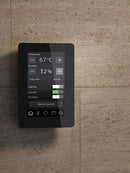 Elite control panel mounted on a tiled wall