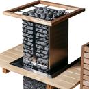 Huum cliff sauna heater embedded in light wooden bench with bordering flange and safety rail