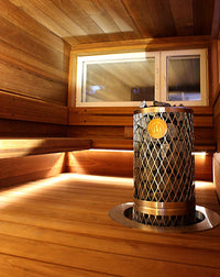 Iki Pillar sauna heater embedded in a sauna floor