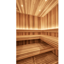 Well lit sauna interior with light coloured timber lining the walls and ceiling