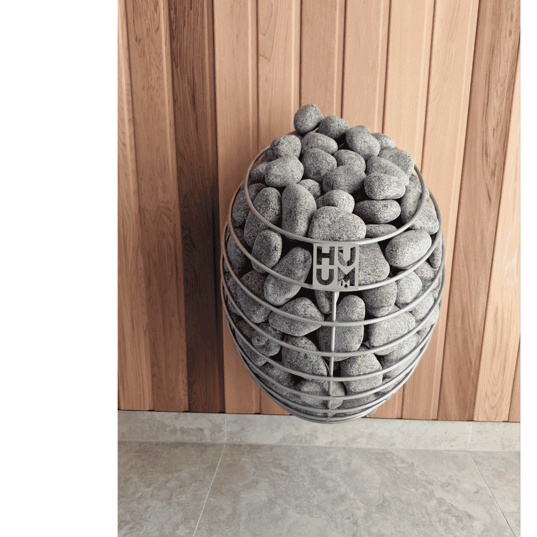 Western red cedar wall panelling with a HUUM drop sauna heater attached to the wall