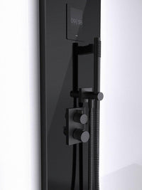 Black Tylo Steam shower panel with digital display and handheld shower on a white background